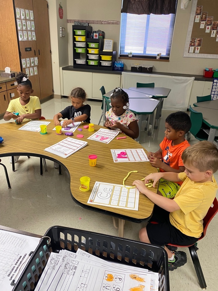 students working at small group table