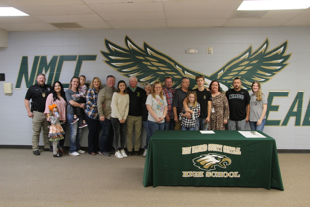 Phillips with family and friends at signing