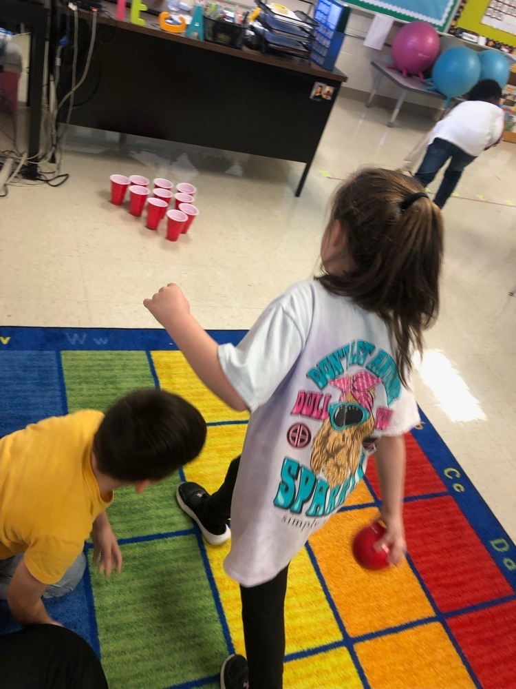 Students bowling to make subtraction sentences. 