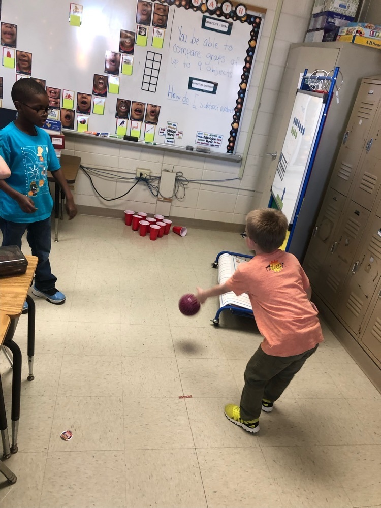Students bowling to make subtraction sentences. 