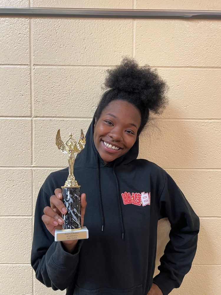 Emani and her trophy